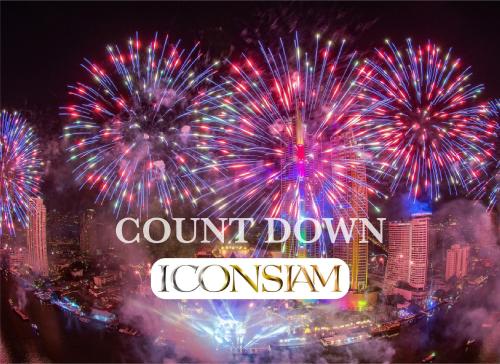 a fireworks display with the words count down to ioannis at Belivin'98 Sense of Pier Sathorn Residence in Bangkok