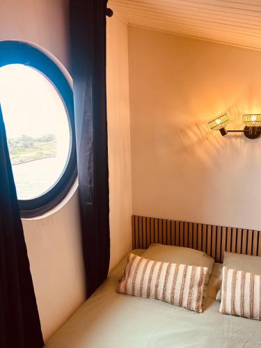 Postel nebo postele na pokoji v ubytování LOVE IN JUNGLE Appartement avec vue unique