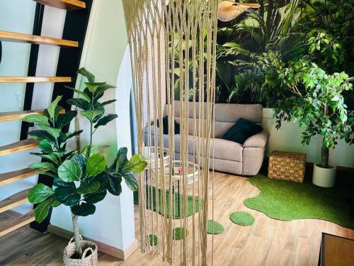 Posezení v ubytování LOVE IN JUNGLE Appartement avec vue unique