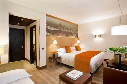 Postel nebo postele na pokoji v ubytování Starhotels Ritz