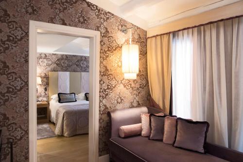 Ένα ή περισσότερα κρεβάτια σε δωμάτιο στο Splendid Venice - Starhotels Collezione