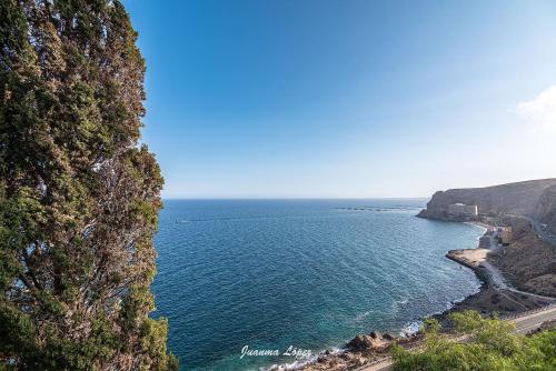 a view of the ocean from a cliff at El Barco in Almería