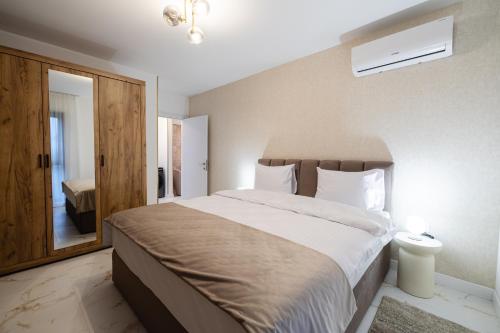 Ένα ή περισσότερα κρεβάτια σε δωμάτιο στο Privilege Apartments Copou