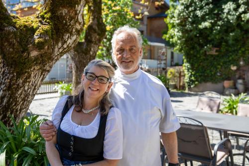 a man and a woman posing for a picture at Hotel Gasthaus Schäfle in Bürserberg