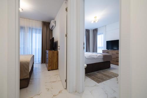 Ένα ή περισσότερα κρεβάτια σε δωμάτιο στο Privilege Apartments Copou