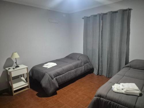 Ένα ή περισσότερα κρεβάτια σε δωμάτιο στο FDH Apart