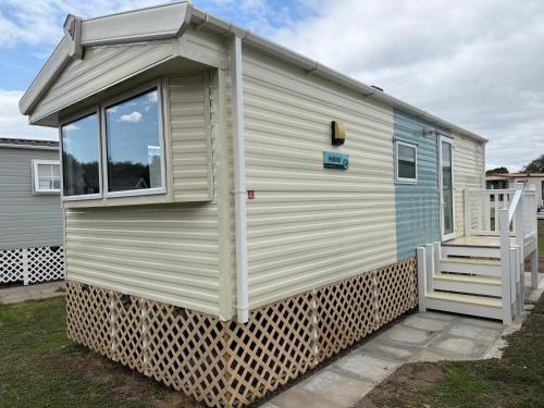 awning on the side of a tiny house at Severn valley caravan park in Quatford