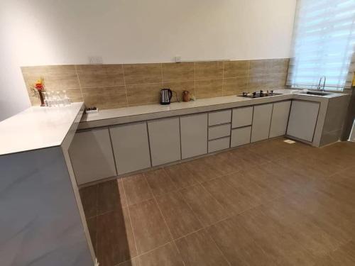 Η κουζίνα ή μικρή κουζίνα στο Bentong Fun Homestay