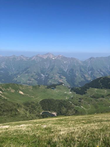 a view of a mountain range with mountains in the background at Chalet Weidli in Achseten