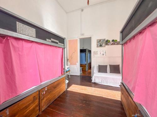 Un ou plusieurs lits dans un hébergement de l'établissement Tenerife Art Hostel