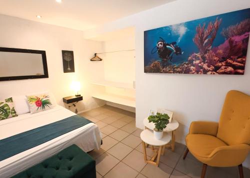 Postel nebo postele na pokoji v ubytování Ocean Lovers Taganga - PADI Dive Center & Hostel