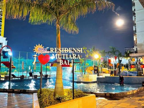 a water park with a sign that reads restricted in marina ball at Bali Residence by D'RZ Muslim Seaview Homestay in Melaka