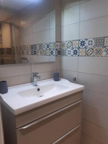 a bathroom with a sink and a mirror at la casa des gorges du verdon in Aiguines