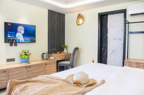 Cama ou camas em um quarto em Villasiita, Jaipur