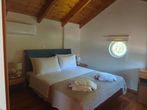 Ένα ή περισσότερα κρεβάτια σε δωμάτιο στο Oasi Loft