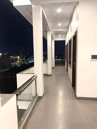 a balcony of a building with a view of the city at The Horizon Hotel in Ða Gia