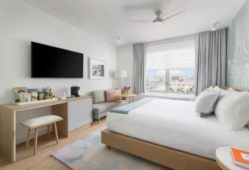 Ένα ή περισσότερα κρεβάτια σε δωμάτιο στο Park Central South Beach