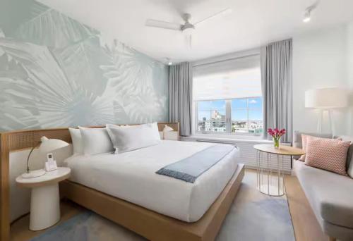 Ένα ή περισσότερα κρεβάτια σε δωμάτιο στο Park Central South Beach