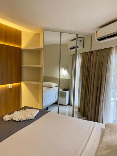 Postel nebo postele na pokoji v ubytování Jatiuca Suítes Resort FLAT