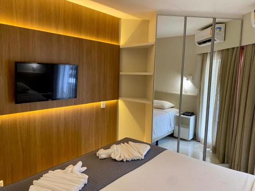 Postel nebo postele na pokoji v ubytování Jatiuca Suítes Resort FLAT