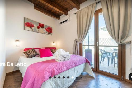 Postel nebo postele na pokoji v ubytování Sardegna Relax House