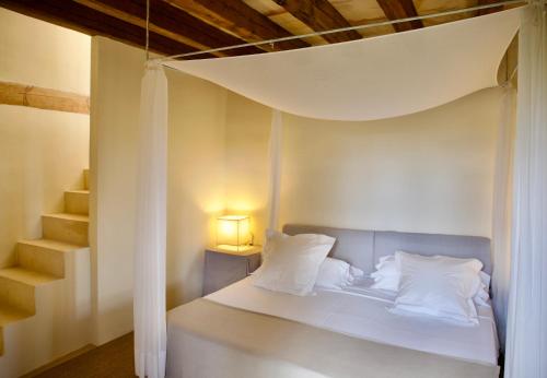 Postel nebo postele na pokoji v ubytování Son Gener Hotel Spa