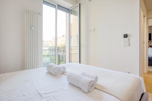 En eller flere senge i et værelse på Easylife - Milano - Torino 64 P2N6 - Duomo