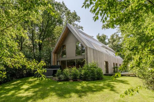 Κήπος έξω από το Woodz Lodges