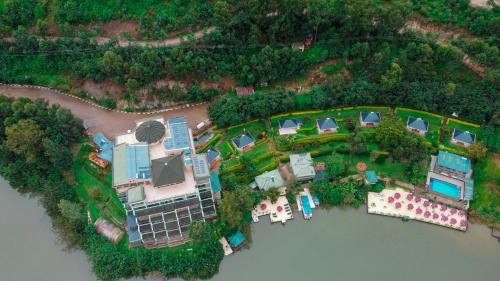 an aerial view of a house on the water at Bunyonyi Safaris Resort in Kabale