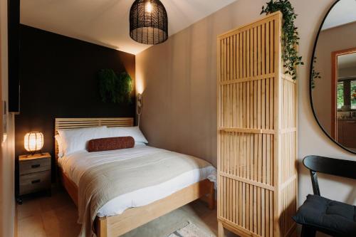 Ένα ή περισσότερα κρεβάτια σε δωμάτιο στο Shizuka Lodge
