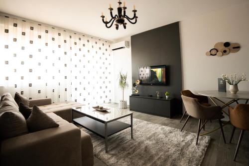 TV i/ili multimedijalni sistem u objektu Rooftop Apartment