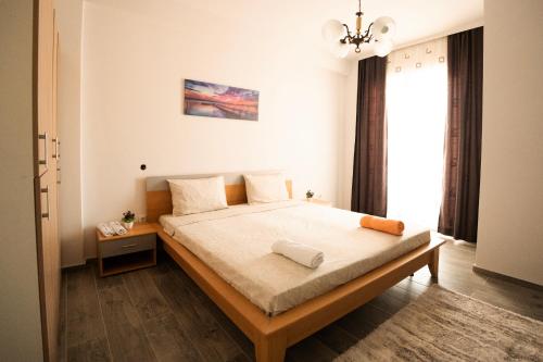 Krevet ili kreveti u jedinici u okviru objekta Rooftop Apartment