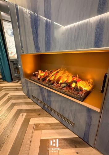 a oven with a fire inside of it at Iris Hotel in Erbusco