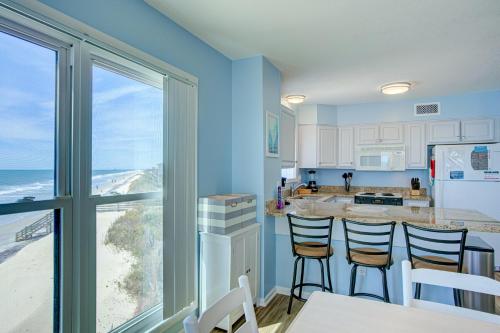 a kitchen with a view of the ocean at Topsail Dunes 1214 in North Topsail Beach