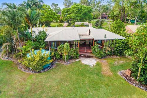 an aerial view of a house with a garden at Nature Escape Acreage Forest Life and Pet Friendly in Boronia Heights