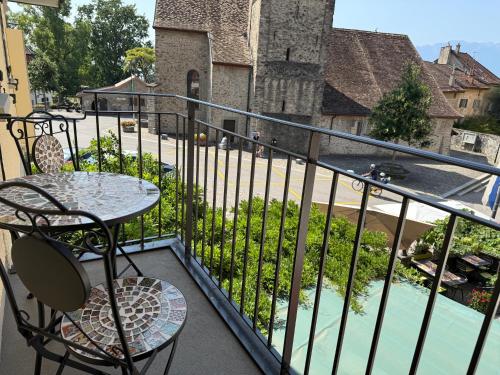 Uma varanda ou terraço em Hotel de la Place