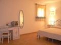 Un ou plusieurs lits dans un hébergement de l'établissement Hotel Valkarana Country Relais