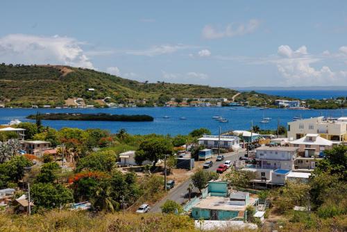 a view of a town and a body of water at Ulala Culebra in Culebra