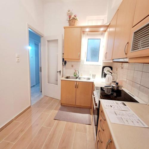 Kuchyň nebo kuchyňský kout v ubytování Iris' Home