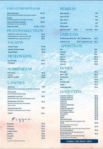 a view of the menu of the restaurant at MALIA MURO ALTO STUDIO 300m DO MAR in Porto De Galinhas