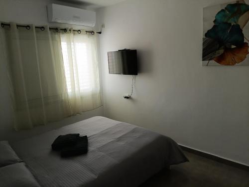 Кровать или кровати в номере Uni Comfort