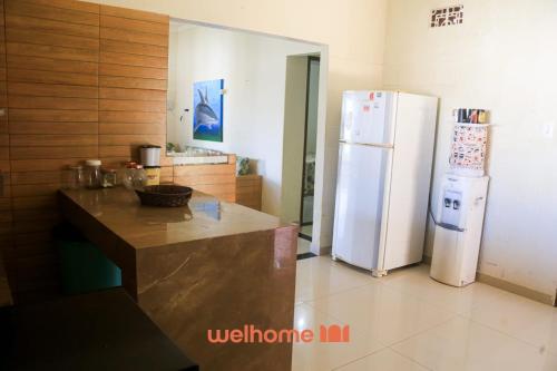 Dapur atau dapur kecil di Casa em Natal com piscina 4min da praia