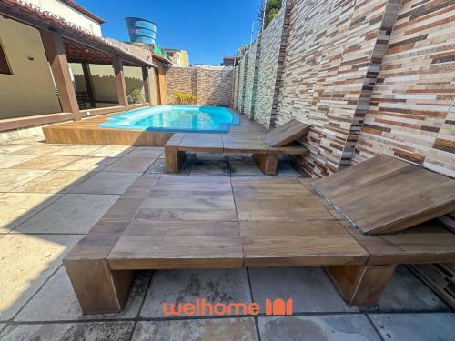Kolam renang di atau dekat dengan Casa em Natal com piscina 4min da praia