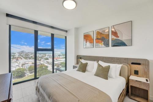 Letto o letti in una camera di 72 Park by Nomada Residences