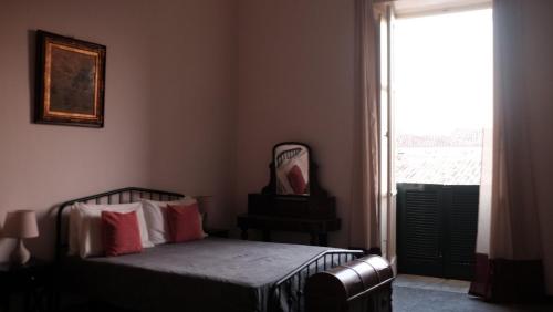 Katil atau katil-katil dalam bilik di Classic residence in the historic center