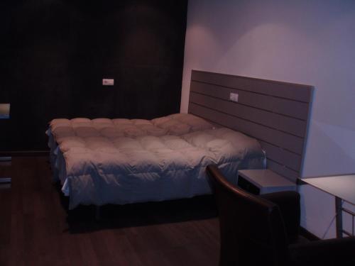 Cama o camas de una habitación en Hostal Torres