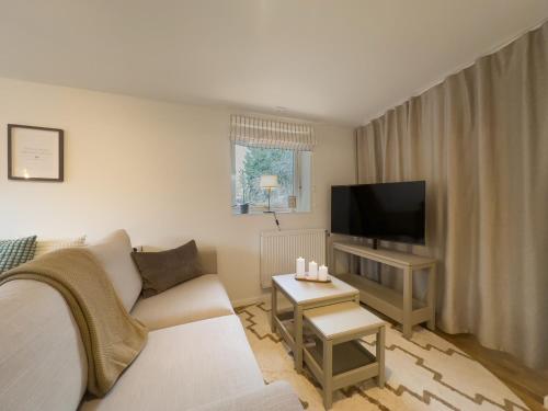 TV a/nebo společenská místnost v ubytování Prinshöjden Hotel - Smart Digital Apartments & Villas
