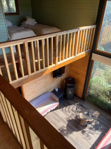 an overhead view of a bunk bed in a house at Lofts Magnolias in Puerto Varas