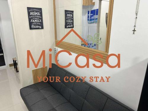 a sign for a mcco your coon shop at MiCasa South Residences Cozy & Affordable Stay in Manila
