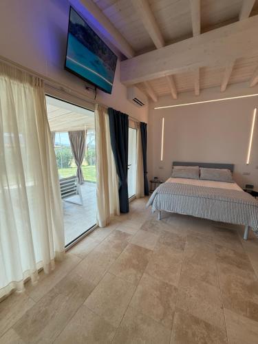 Katil atau katil-katil dalam bilik di Baia del Sole Resort